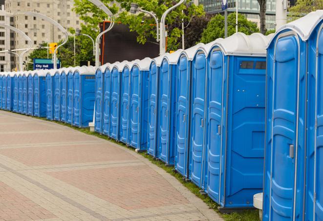 portable restrooms lined up at a marathon, ensuring runners can take a much-needed bathroom break in Bloomington